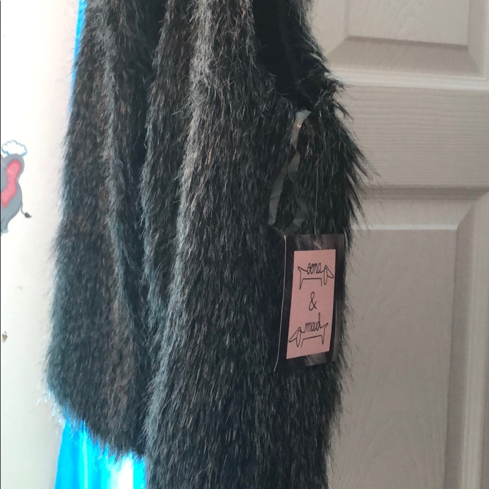 Vests - Picture 2 of 2